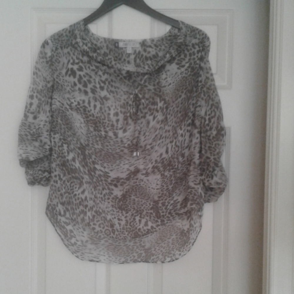 Jennifer Lopez animal print blouse